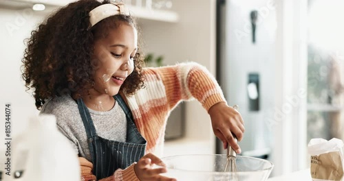 Girl, bake and taste with bowl in kitchen, mixing and cooking ingredients with kid for childhood development. Mixture, whisk for cake preparation and dessert recipe or happy, learning and growth