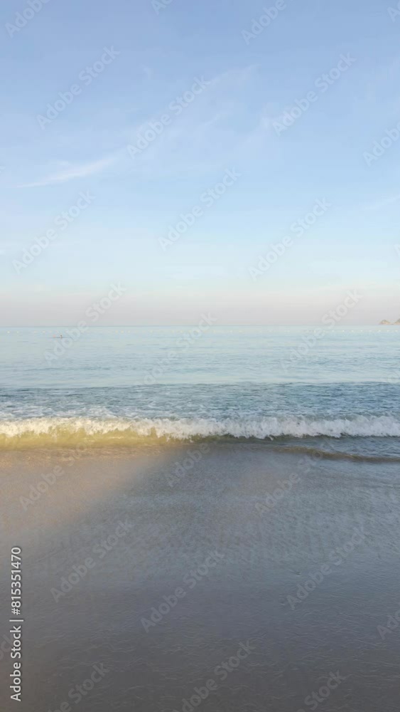 veritcal timelapse tropical white sand smooth beach with calm sea ocean and sunrise clear blue sky background.tropical white sand beach with blue sky and white cloud background veritcal timelapse tropical white sand smooth beach with calm sea ocean and sunrise clear blue sky background.tropical white sand beach with blue sky and white cloud background