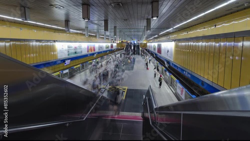 top down timelapse view of crowded passenger get on and get off from subway train while train arrive and depart from platform subway in rush hour.