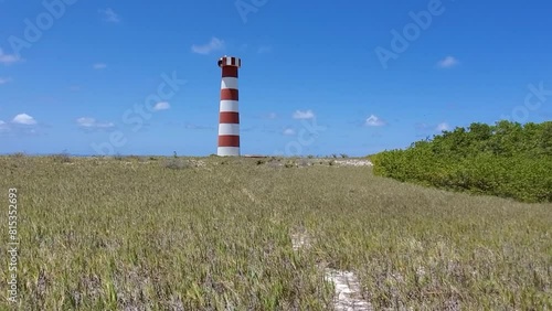 Dirt road towards lighthouse, cayo de agua island Los Roques Venezuela, tilt down  photo