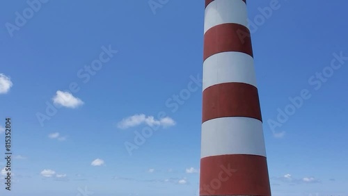 Tower lighthouse close up in cayo de agua island, tilt down from top until botom photo