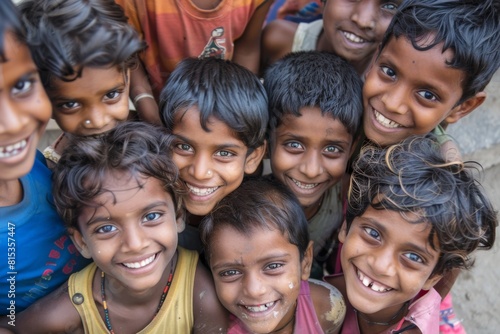 Group of happy Indian children smiling and looking at camera.