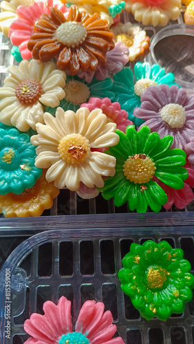 Aalaw or Alua, Thai traditional candy sweet dessert.Flower shaped alua dessert photo