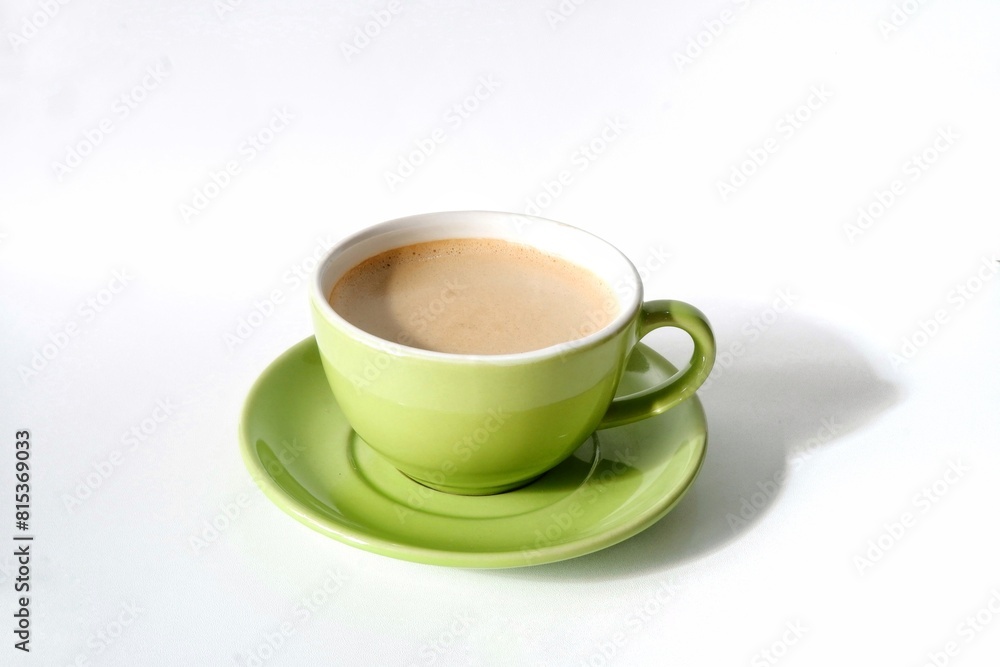 A cup of hot cappuccino isolated on white A cup of hot cappuccino isolated on white