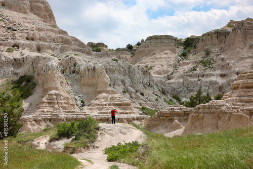 Taking photos of the valley at the Notch Trail at Badlands National Park, South Dakota