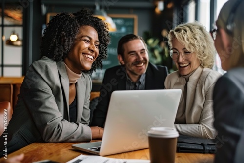 Group of diverse business people working together in a coffee shop. Business people working together in a coffee shop.