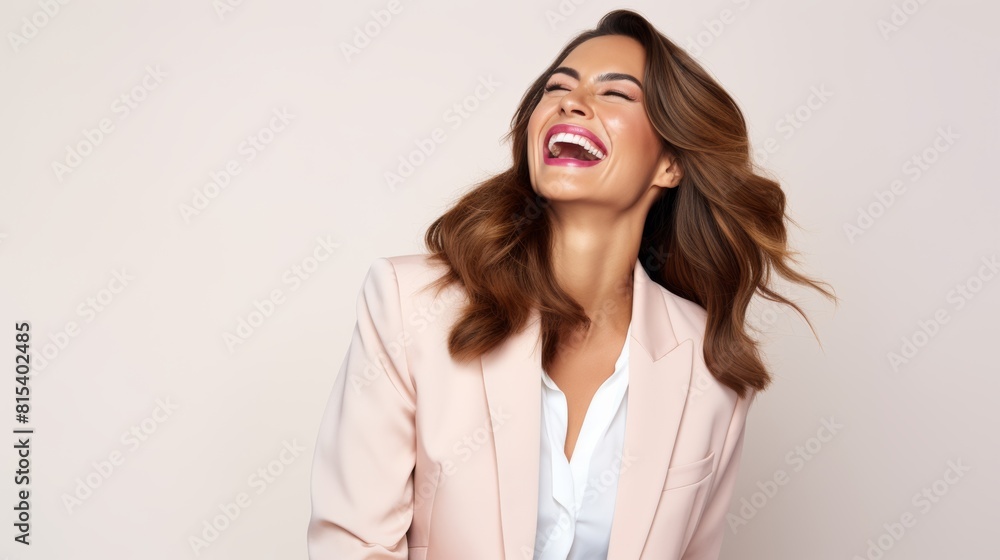 Laughing woman in blush suit, joyful and carefree, on a plain background Laughing woman in blush suit, joyful and carefree, on a plain background