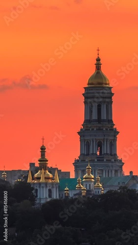 Illumination of the Bell Tower of Kyiv Pechersk Lavra at night vertical video time lapse photo