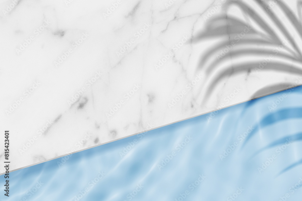 Swimming pool top view background with palm leaves shadow on marble table top and blue water ring waves,Backdrop banner of Summer tropical background for cosmetics product placement podium mockup Swimming pool top view background with palm leaves shadow on marble table top and blue water ring waves,Backdrop banner of Summer tropical background for cosmetics product placement podium mockup