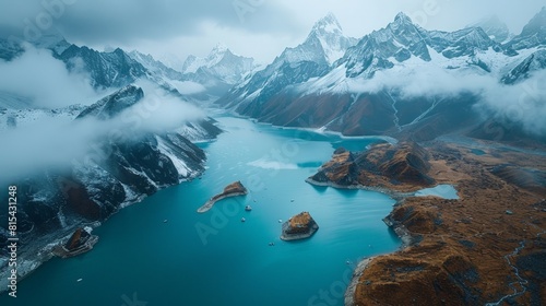 Aerial view of the Gokyo Lakes in Nepal, showcasing the stunning turquoise glacial lakes surrounded by snow-capped peaks and rugged terrain.      © mozzang