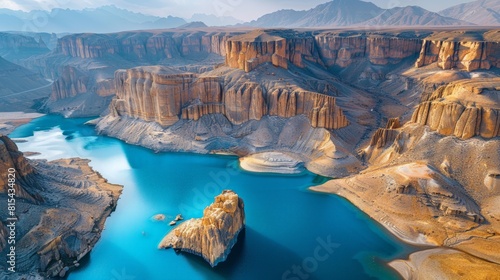 Aerial view of the Band-e Amir National Park in Afghanistan, showcasing its stunning blue lakes, surrounded by rugged mountains and unique rock formations.      photo