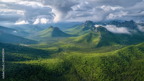 Aerial view of the Ural Mountains in Russia  featuring the rugged peaks  dense forests  and expansive valleys.     