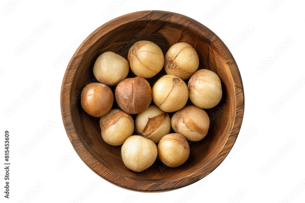 Macadamia in a wooden bowl isolated on transparent background Macadamia in a wooden bowl isolated on transparent background