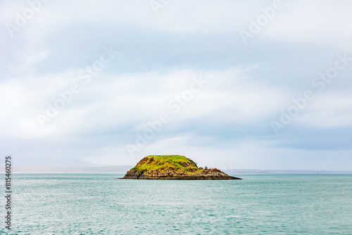 Deserted Island Surrounded by Teal Water © Cavan