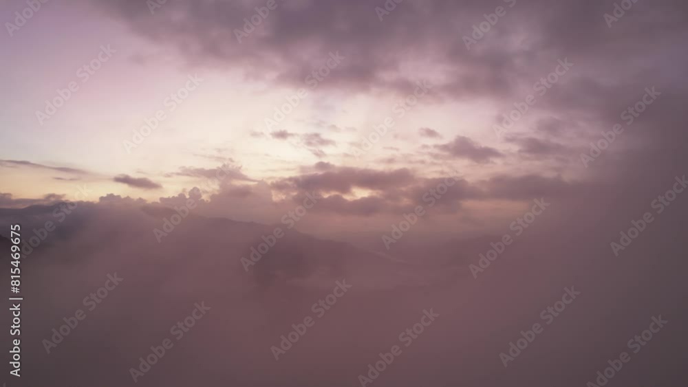 Drone flight through the morning mist and sunrise sky Drone flight through the morning mist and sunrise sky
