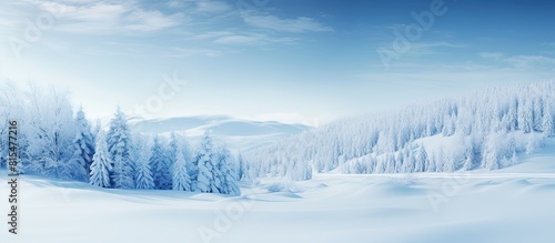 A winter themed Christmas landscape with a serene snow covered setting. Creative banner. Copyspace image © HN Works