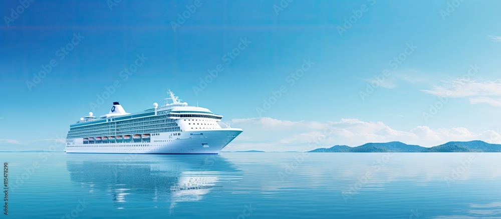 A cruise ship s side descending into the calm azure waters of the ocean with ample copy space image A cruise ship s side descending into the calm azure waters of the ocean with ample copy space image
