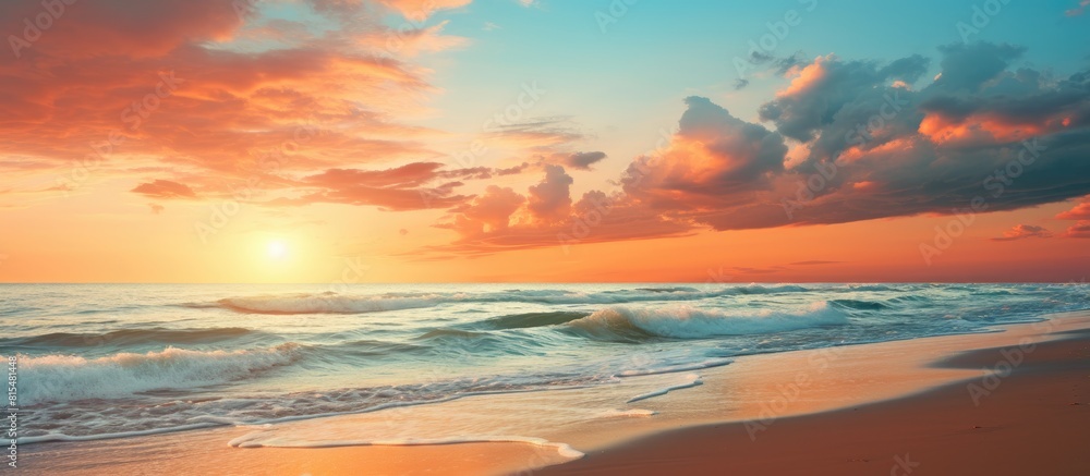 Sunset over the beach with a beautiful sky as a backdrop providing ample copy space for images Sunset over the beach with a beautiful sky as a backdrop providing ample copy space for images