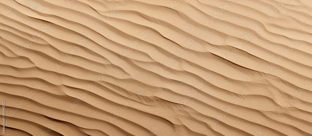 Closeup of sand texture with a horizontal beach pattern offering copy space for text Closeup of sand texture with a horizontal beach pattern offering copy space for text