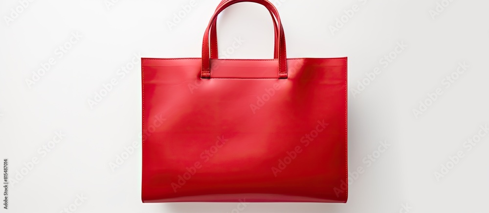 Top view of a red paper bag on a white background with copy space The ...