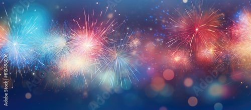 An abstract holiday background featuring blurred fireworks at New Year with copy space for customization