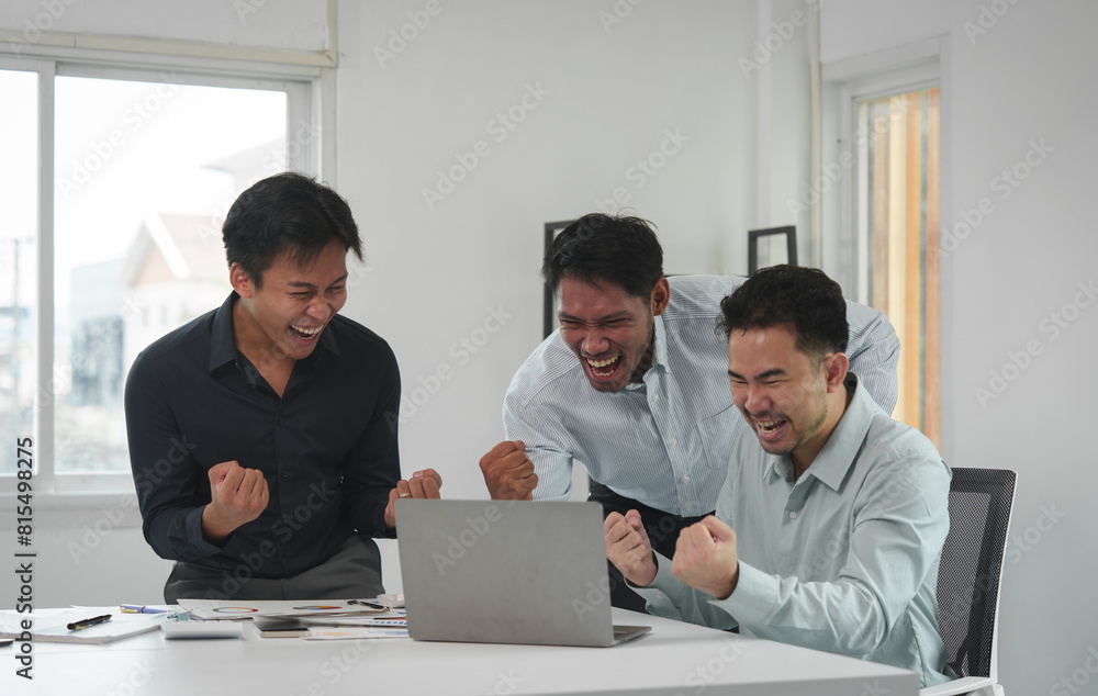 Happy team of young Asian businessmen Congratulate together and celebrate your success in starting your business. Brainstorming meeting of creative team, partners, teamwork concept in office. Happy team of young Asian businessmen Congratulate together and celebrate your success in starting your business. Brainstorming meeting of creative team, partners, teamwork concept in office.