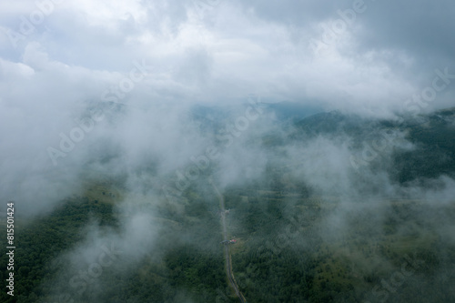 Aerial photography of the road in the Huangganliang Valley of the Greater Hinggan Mountains on the Rea Line in Keshiketeng Banner, Chifeng City photo