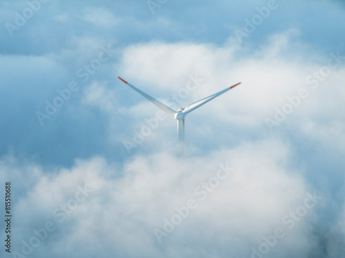 campo de energias eolicas renovables entre las nubes photo