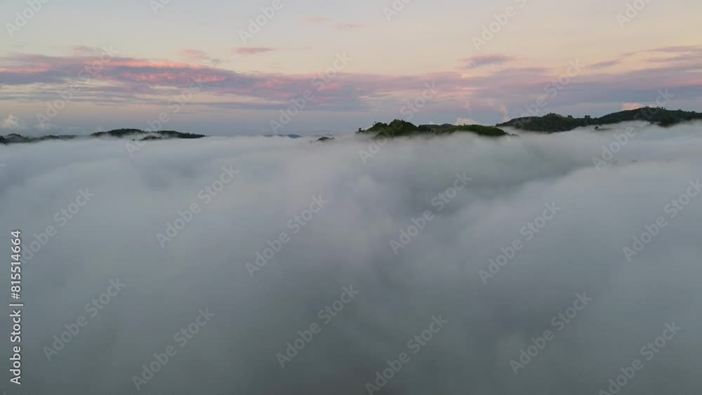 Aerial view of fog in the mountain at Gorontalo, Indonesia. Sunrise over the clouds in the morning