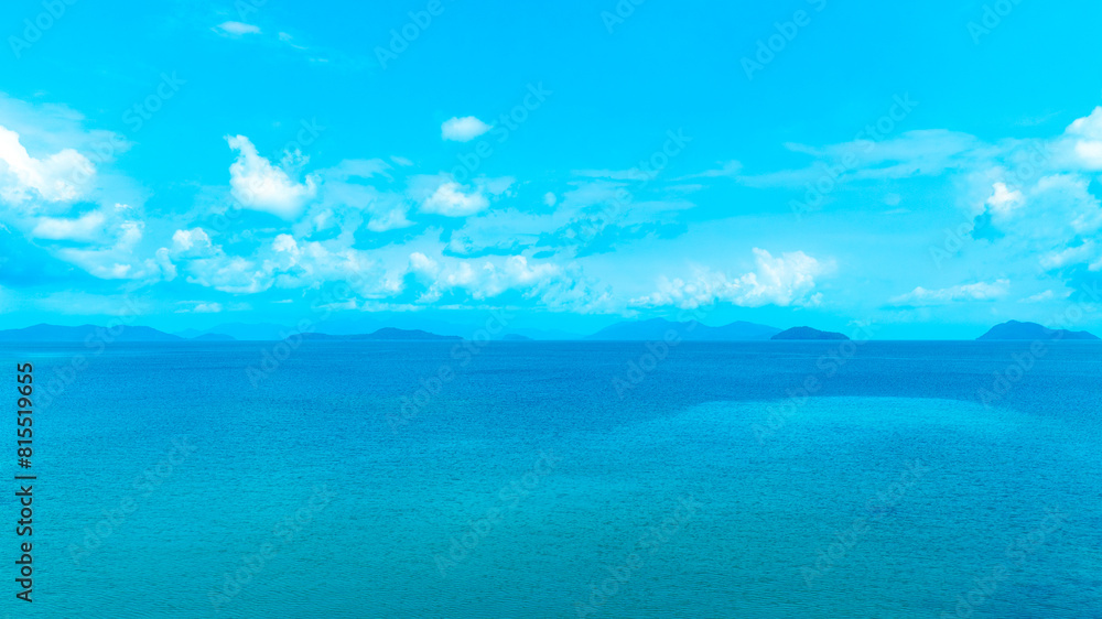 Ocean sea background and the clear sky For summer vacation ideas Nature of summer sea water with sunlight The sea sparkles against the blue sky	
