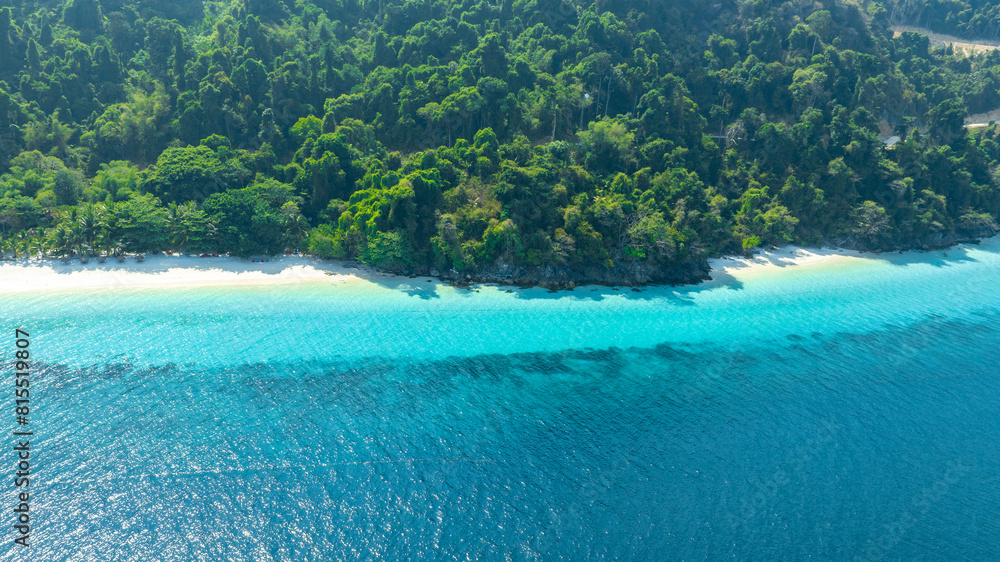 Aerial view of islands, Andaman Sea, natural blue waters and forests, tropical sea of Thailand. Beautiful scenery of the island with beautiful nature.