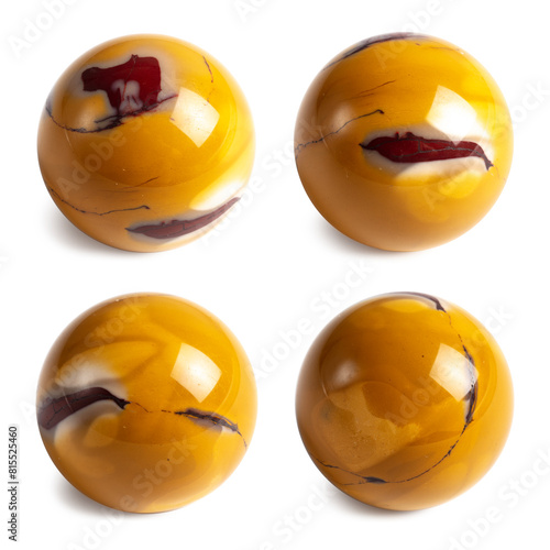 A variety of jasper - Yellow Mookaite. Stone sphere in four positions, isolated background. Collecting and magic concept. A hand-taken photo, not AI