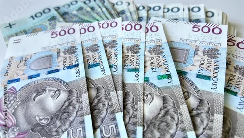 Polish money counted on the table, highest denomination of PLN 500. photo
