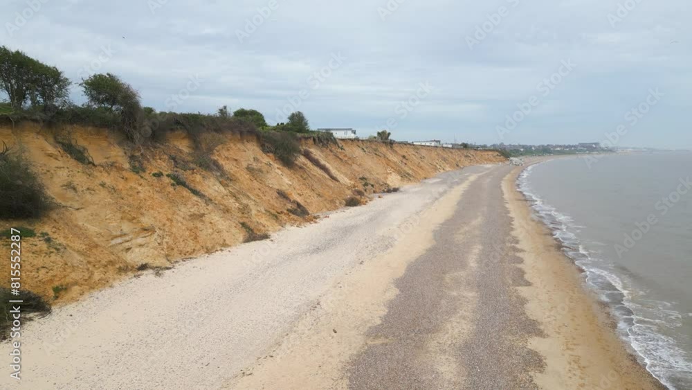 Drone shot of an empty road along Pakefield Beach in Lowestoft, England. Drone shot of an empty road along Pakefield Beach in Lowestoft, England.