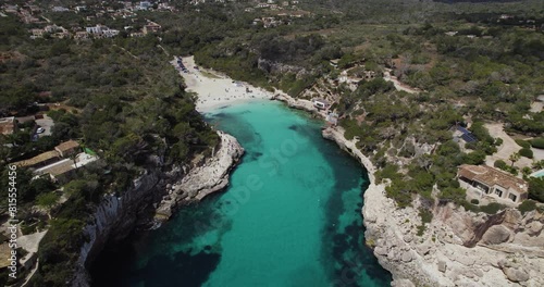 Aerial View of Turquoise Inlet Water of Cala Llombards Beach in Mallorca, Spain photo