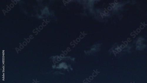 Time lapse of clouds in the sky at night