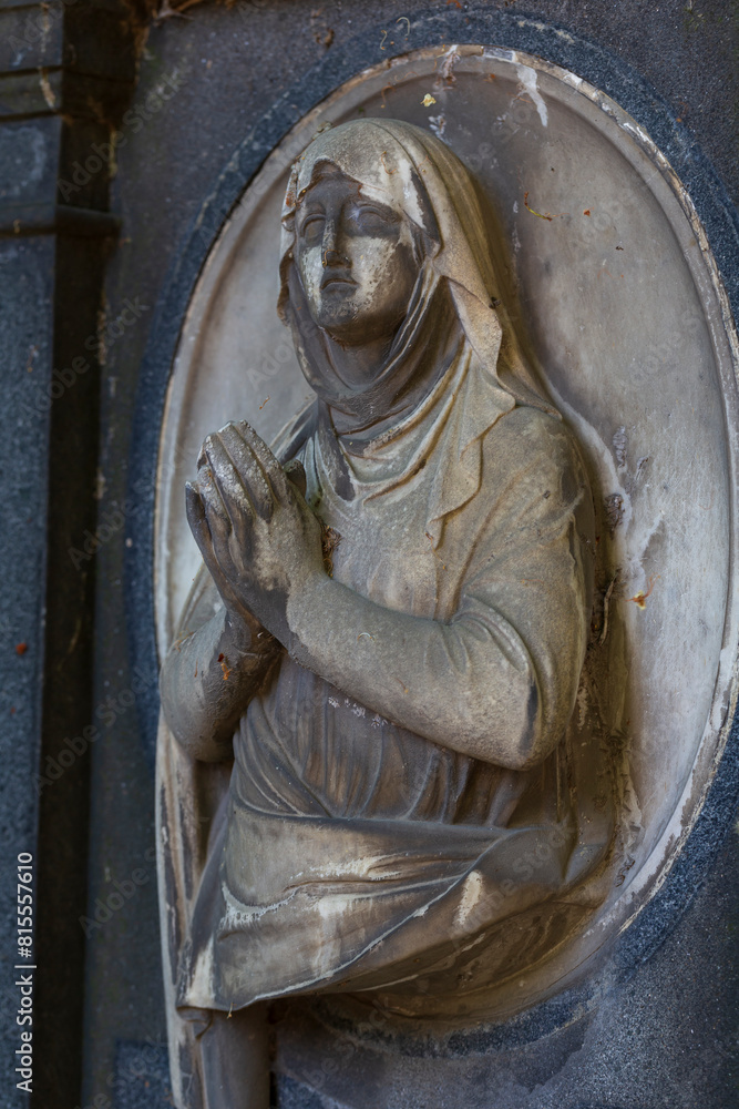 Historic Statue on the mystery old Prague Cemetery, Czech Republic
