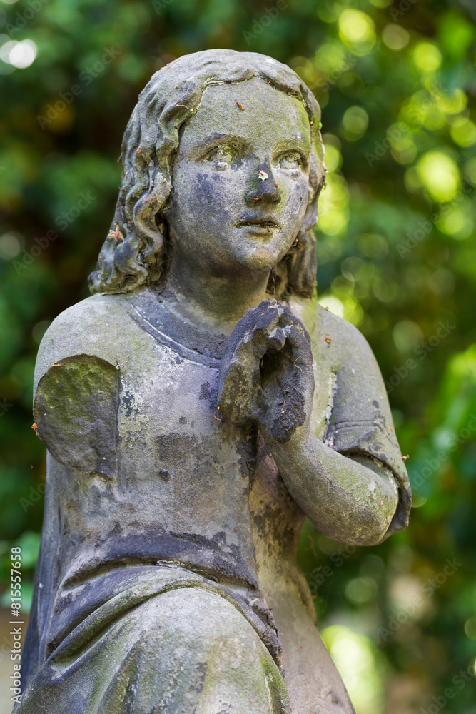 Historic Statue on the mystery old Prague Cemetery, Czech Republic
