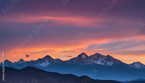 A mountain range outlined against a colorful sunse © Umm