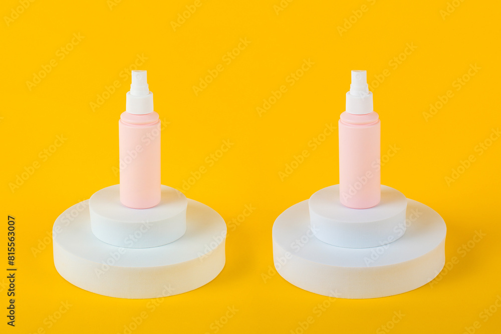 Cosmetic pink bottle, bottle, lotion or serum with stylish props on yellow background.
Cosmetic pink bottle, bottle, lotion or serum with stylish props on yellow background.