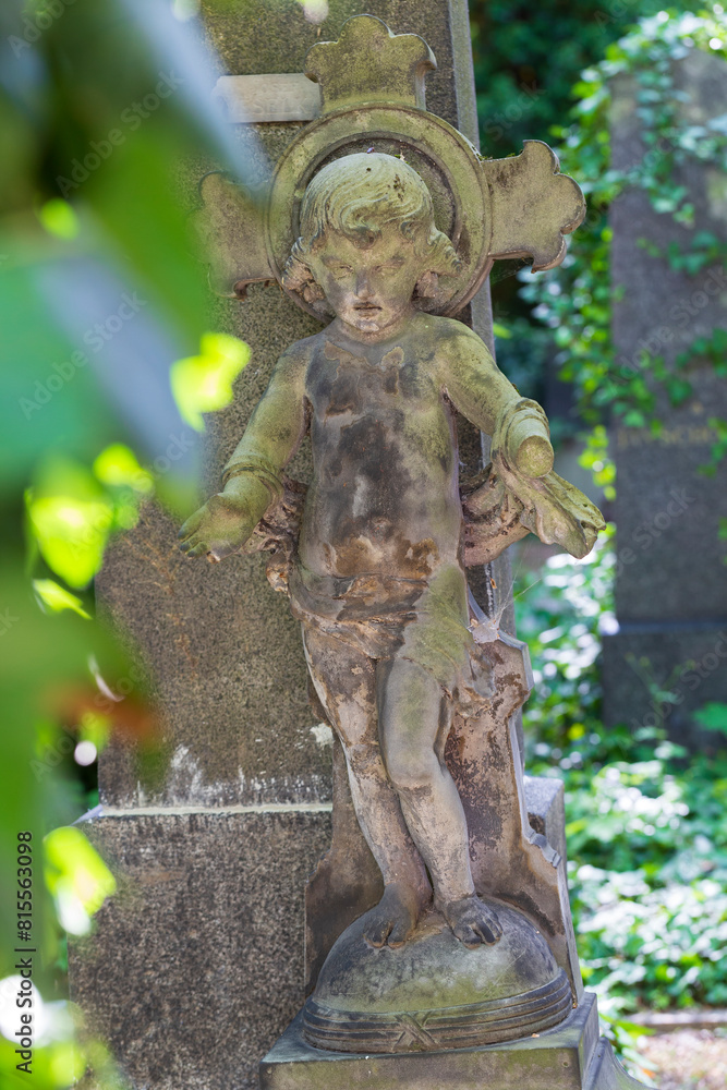 Historic Statue on the mystery old Prague Cemetery, Czech Republic