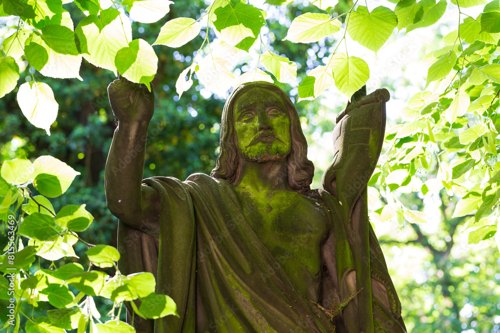 Historic Statue on the mystery old Prague Cemetery, Czech Republic
