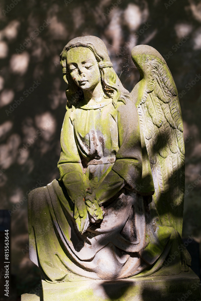 Historic Statue on the mystery old Prague Cemetery, Czech Republic