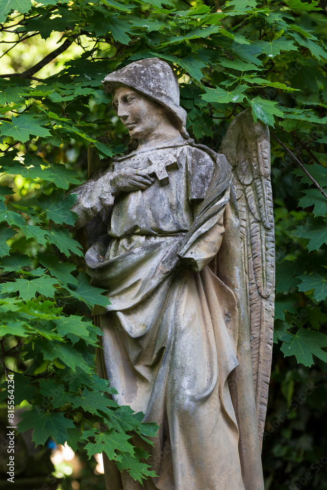 Historic Statue on the mystery old Prague Cemetery, Czech Republic