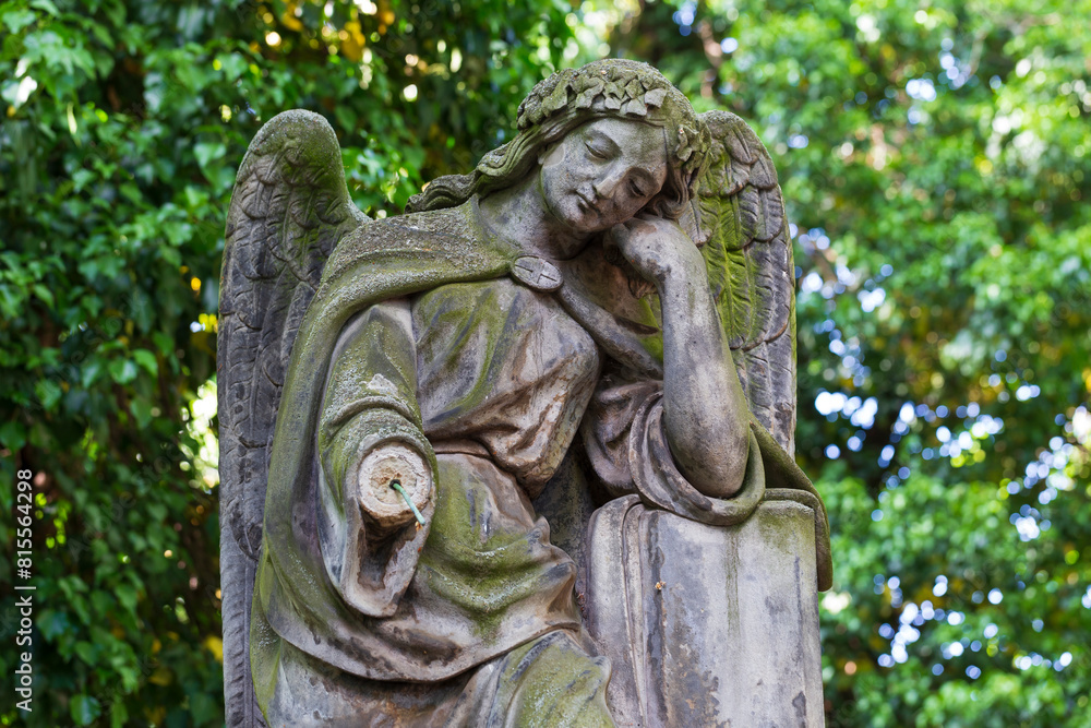 Historic Statue on the mystery old Prague Cemetery, Czech Republic
