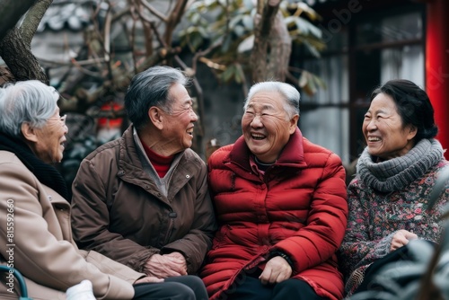 Group of asian senior people having fun together in the park. © Loli