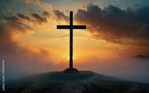 Jesus Christ cross, Christian cross on a background of dramatic sky and fog landscape, sunset