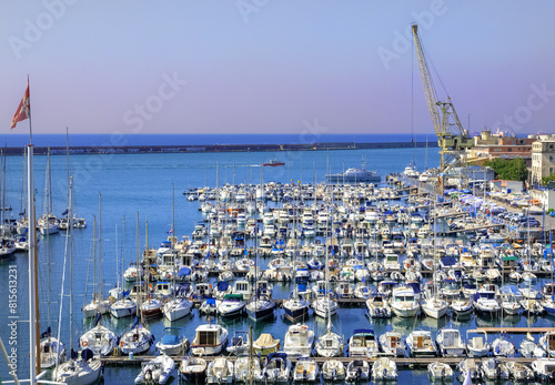 Boats moored in the harbor of Genoa in Italy