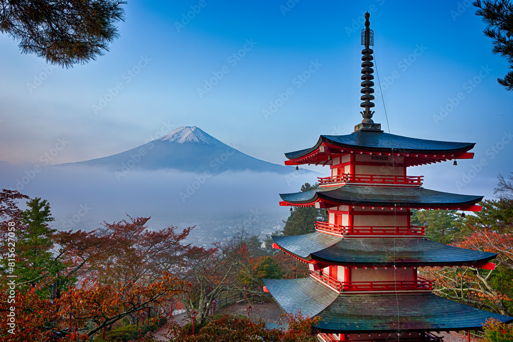 Japan Travel Destinations. Famous Kiyomizu-dera Temple Pagoda Against Kyoto Skyline  and Traditional Red Maple Trees