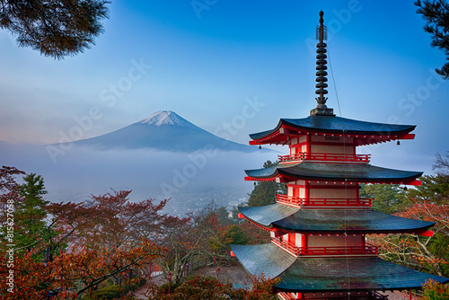 Japan Travel Destinations. Famous Kiyomizu-dera Temple Pagoda Against Kyoto Skyline  and Traditional Red Maple Trees